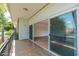 Sliding door off of balcony leads into the home's bright living room with tile floors at 330 W Maryland Ave # 207, Phoenix, AZ 85013
