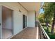 Balcony with textured railing offers outdoor living, and a sliding door at 330 W Maryland Ave # 207, Phoenix, AZ 85013
