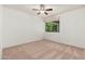 A spacious bedroom featuring neutral carpet and a large window that offers plenty of light at 330 W Maryland Ave # 207, Phoenix, AZ 85013