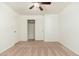 An empty bedroom with a closet is ready for you to make it your own at 330 W Maryland Ave # 207, Phoenix, AZ 85013