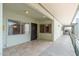 Inviting entryway featuring tile flooring, a covered walkway, and secure access to the unit at 330 W Maryland Ave # 207, Phoenix, AZ 85013