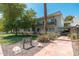 Well-maintained building with lush landscaping and inviting walkway provides a welcoming atmosphere at 330 W Maryland Ave # 207, Phoenix, AZ 85013