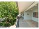 Scenic view from a balcony showcasing the lush landscaping and building architecture at 330 W Maryland Ave # 207, Phoenix, AZ 85013