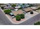 An aerial view displays a well-maintained home with mature trees enhancing the curb appeal at 4822 N 63Rd Ln, Phoenix, AZ 85033