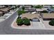 Aerial view capturing a cozy home with mature trees enhancing the curb appeal and a welcoming neighborhood at 4822 N 63Rd Ln, Phoenix, AZ 85033