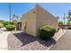 Exterior view of a home with stucco walls, desert landscaping, and a private driveway at 515 S Saguaro Way, Mesa, AZ 85208