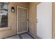 Inviting front entrance with security door and textured exterior at 515 S Saguaro Way, Mesa, AZ 85208
