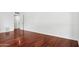 Bright bedroom featuring rich hardwood flooring and ample natural light at 522 W Cambridge Ave, Phoenix, AZ 85003
