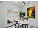 Cozy breakfast nook with light countertops, stylish decor, and backyard access at 522 W Cambridge Ave, Phoenix, AZ 85003