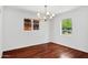 Elegant dining room with hardwood flooring and ample natural light at 522 W Cambridge Ave, Phoenix, AZ 85003