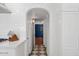 Modern kitchen featuring an arched doorway and updated appliances at 522 W Cambridge Ave, Phoenix, AZ 85003