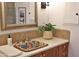 A delightful bathroom featuring a unique floral sink, adding an artistic touch to the space at 5246 N 20Th St # B1, Phoenix, AZ 85016