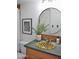 Charming bathroom featuring a stylish sink, vanity, and decorative mirror to enhance the space at 5246 N 20Th St # B1, Phoenix, AZ 85016
