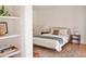 Comfortable bedroom with stylish decor featuring a queen bed, side tables, and textured rug at 5246 N 20Th St # B1, Phoenix, AZ 85016