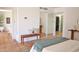 Bright bedroom with laundry access, sliding door closet, and view into living space at 5246 N 20Th St # B1, Phoenix, AZ 85016