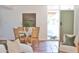 Dining area featuring a round table with woven chairs, modern accents, and natural light at 5246 N 20Th St # B1, Phoenix, AZ 85016