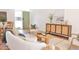 Comfortable living room with modern furnishings, earth tone color palette, and warm, natural light at 5246 N 20Th St # B1, Phoenix, AZ 85016