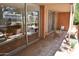 Spacious patio area perfect for relaxing and enjoying the outdoor scenery with brick surround and tile flooring at 5246 N 20Th St # B1, Phoenix, AZ 85016