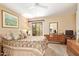 Well-lit bedroom featuring an outdoor patio and traditional furnishings at 6422 N 77Th Way, Scottsdale, AZ 85250