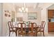 Dining room has a chandelier and a window for natural light at 6422 N 77Th Way, Scottsdale, AZ 85250