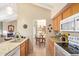 The kitchen is open with a view of the dining and living rooms at 6422 N 77Th Way, Scottsdale, AZ 85250