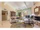 Inviting living room features vaulted ceilings, exposed beams, and fireplace at 6422 N 77Th Way, Scottsdale, AZ 85250