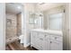 Remodeled bathroom with shower, updated vanity, and tile accents at 6627 S 42Nd Pl, Phoenix, AZ 85042
