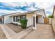 Exterior front porch featuring updated paint, modern windows and decorative 'Home Sweet Home' sign at 6627 S 42Nd Pl, Phoenix, AZ 85042