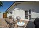Welcoming backyard patio with stylish seating and brick flooring, ideal for enjoying sunny days at 6907 E Palm Ln, Scottsdale, AZ 85257
