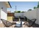 Back patio featuring modern outdoor furniture at 6907 E Palm Ln, Scottsdale, AZ 85257