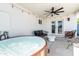 Covered patio featuring a hot tub and modern outdoor furniture at 6907 E Palm Ln, Scottsdale, AZ 85257