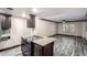 Contemporary kitchen with granite island, stainless steel appliances, and wood-look flooring at 7126 N 19Th Ave # 228, Phoenix, AZ 85021