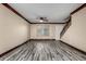 Inviting living room with wood-look floors, natural light, and modern accents at 7126 N 19Th Ave # 228, Phoenix, AZ 85021