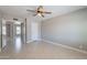 Bedroom featuring tile flooring, neutral walls, ceiling fan and closet at 719 W Pampa Ave, Mesa, AZ 85210