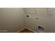 Utility closet featuring washer and dryer hookups at 7327 W Donner Dr, Laveen, AZ 85339
