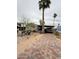 Exterior view featuring a driveway, front yard, and home with a covered parking area at 8218 S 7Th St # Ofc, Phoenix, AZ 85042
