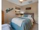 Comfortable bedroom featuring a cozy bed, relaxing decor, and soft lighting at 8447 W Tether Trl, Peoria, AZ 85383