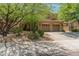 Charming two-story home showcasing a well-manicured desert landscaping and a spacious three-car garage at 8447 W Tether Trl, Peoria, AZ 85383