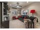 Stylish media room featuring a large television and comfortable seating arrangements at 8447 W Tether Trl, Peoria, AZ 85383