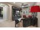Entertainment room with media center, large screen TV, and comfortable seating at 8447 W Tether Trl, Peoria, AZ 85383