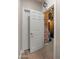 A walk-in pantry is visible through an open door and shows a brick wall and storage for food and supplies at 8447 W Tether Trl, Peoria, AZ 85383