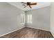A room with wood floors, white walls, and a window at 8758 W Hayward Ave, Glendale, AZ 85305