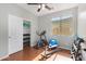 Home gym with wood floors, exercise equipment and natural light at 8758 W Hayward Ave, Glendale, AZ 85305
