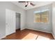 Bright, spacious bedroom with wood floors and closet at 8758 W Hayward Ave, Glendale, AZ 85305