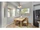 Cozy breakfast nook filled with light, and modern appliances at 8758 W Hayward Ave, Glendale, AZ 85305