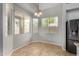 Bright breakfast nook featuring many windows for natural light and modern appliances at 8758 W Hayward Ave, Glendale, AZ 85305