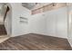 Spacious living room features high ceilings, hardwood floors, and staircase at 8758 W Hayward Ave, Glendale, AZ 85305
