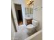 Well-lit bathroom features a toilet, sink, vanity with storage and mirrored medicine cabinet at 8840 E Sunland Ave # 142, Mesa, AZ 85208