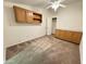 Bedroom featuring a ceiling fan, cabinets, and a closet at 8840 E Sunland Ave # 142, Mesa, AZ 85208