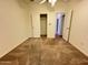 Bedroom with neutral decor and a double door closet at 8840 E Sunland Ave # 142, Mesa, AZ 85208
